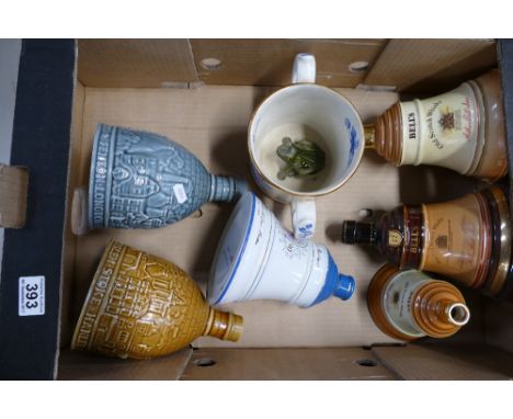 A collection of Wade items to include Bells decanter bottles, Wade two handled frog mug, etc