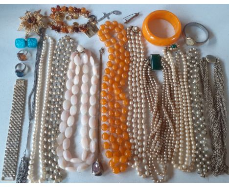 A quantity of vintage costume jewellery to include a large Sphinx gold tone floral brooch with central amber glass stone, 2 d