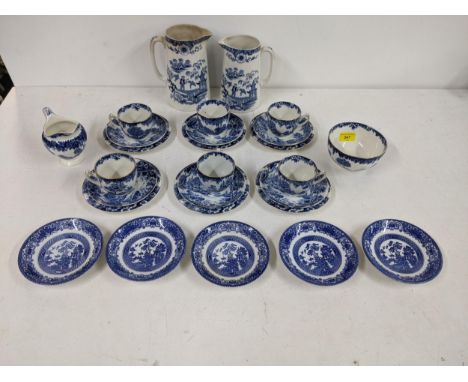 A small lot of blue and white china comprising of two jugs, six plates, six saucers, six cups, five saucers, five saucers, mi