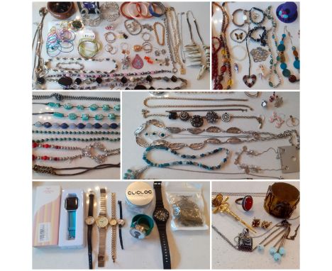 A quantity of mainly modern fashion jewellery and watches to include a white metal and amber coloured cabochon ring, a mid 20