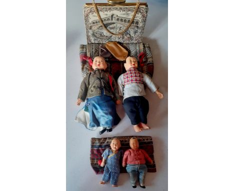 A mid 20th Century La Marquise tapestry bag with gold tone hardware and chain handle together with a family of 4 Chinese doll