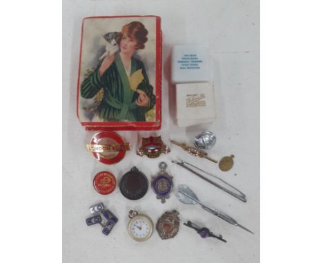 Vintage enamelled badges to include London Buses, a 1950's silver Hanwell District Footballers League pendant, bar brooches, 