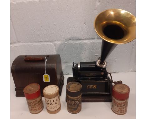 A late 19th/early 20th Century Thomas Edison Gem phonograph in domed oak case, serial no:226144 with horn and boxed cylinder 