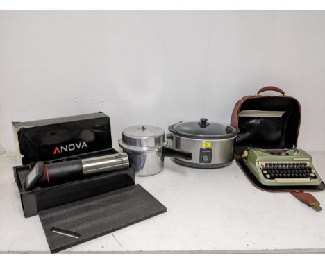 A mixed lot to include a boxed Anova Sous Vide Immersion cooker, cased Imperial Good Companion typewriter, Morphy Richards sl