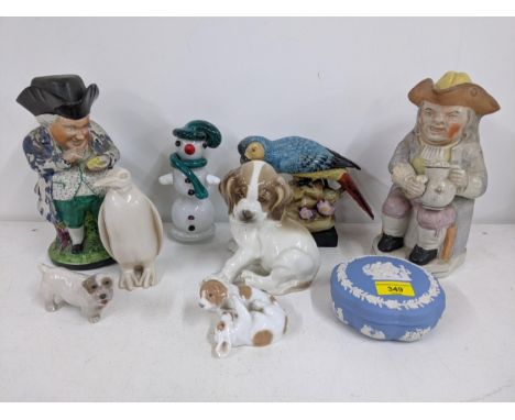 A mixed lto to include a pair of Toby jugs, model clogs, a Wedgwood Jasperware trinket box and other items (A/F)LocationIf th