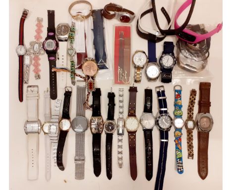 A quantity of modern fashion watches A/F to include Fossil and Guess, together with a late 20th Century ladies Timex and a Sw