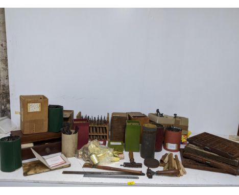 A good quantity of bookbinders and printers tools, letters and other accessories to include 22 carat deep golf leaf, four sma