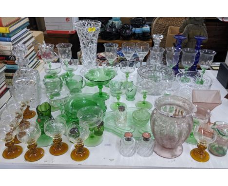 Mixed glassware to include a crystal cut vase, early 20th century uranium glassware, guilloche enamel dressing table bottles 