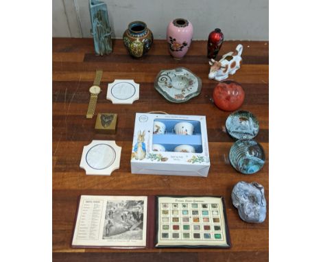 A mixed lot to include three Caithness paperweights, two boxed Herend miniature wall plaques, a stainless steel Rotary gents 