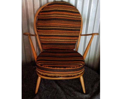 A mid 20th century Ercol light elm and beech armchair Location:If there is no condition report shown, please request