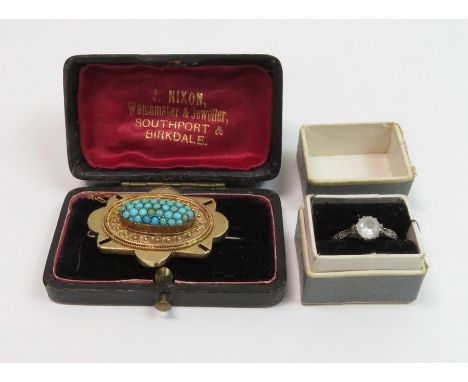A Victorian turquoise cluster brooch, locket back, stamped ‘15ct’, 11.8 g gross; with a single stone 9 carat gold ring, 1.9 g