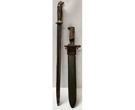 A German short sword with brass eagle head pommel and wood grip, lacks scabbard, blade 41cms and together with a USA bayonet 