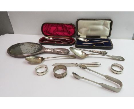 A cased silver spoon and pusher set; a cased spoon and fork set; a Georgian Scottish silver table spoon; a Georgian silver de