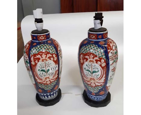 A near pair of Japanese Imari balluster vases now converted to lamp bases mounted on wooden bases, jars approx 30cms high wit