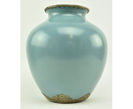 A vintage Chinese duck egg blue glazed vase. The flared rim ovoid shaped vase decorated with ruyi clouds motif metal rim and 