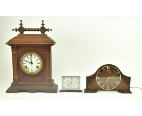 A collection of three early - mid 20th century mantle clocks. The lot comprising a 1920s Art Deco chrome cased desk clock of 