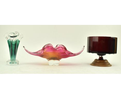 A collection of three pieces of 20th century studio art glass pieces. The lot comprising a pink Chribska freeform bowl, a rub