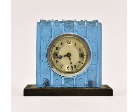 An early 20th century French Art Deco blue frosted glass bedside / desk clock. The clock face inset in a square blue frosted 