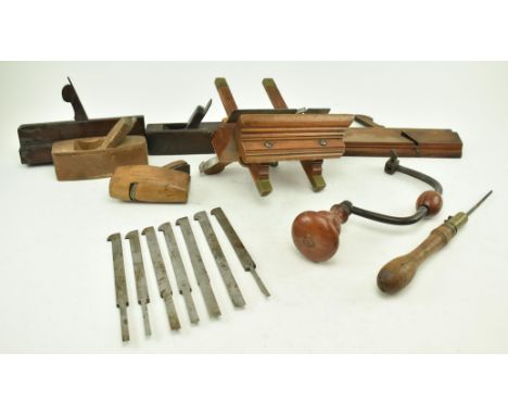 A collection of vintage carpentry tools. The lots to include Atkin &amp; Sons plane, two ogee planes, three wooden moulding p