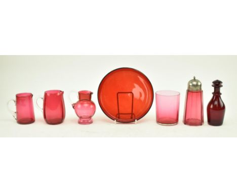 Seven pieces of mid 19th century &amp; later glassware in ruby and cranberry. The lot comprising a circular ruby glass tray, 