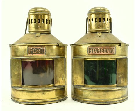 A pair of early 20th century nautical ship's brass oil lamp lanterns. The lanterns marked Port &amp; Star boars, one with gre