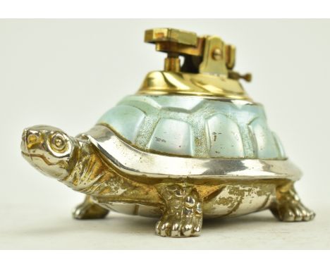 A vintage 20th century novelty cigarette lighter in the form of a tortoise. The light with gilt metal mechanism, the turtle w