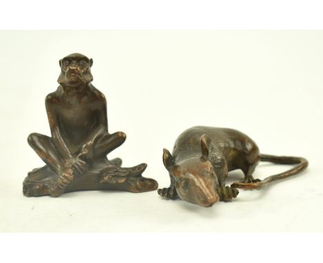 Two 20th century Chinese bronze ornaments figures. The lot to include one depicting a monkey in a seated position with three 