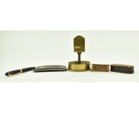 A collection of five 19th century pieces. The lot comprising a horn snuff box, a Japanese cigarette holder, a match holder, a