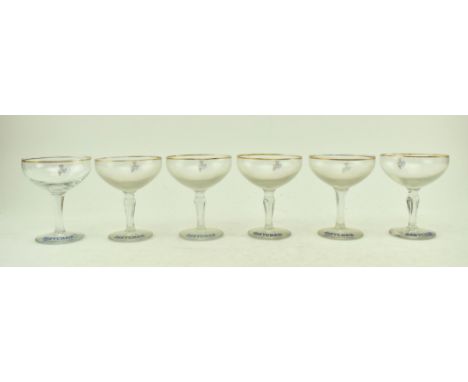 Babycham - A set of six vintage mid 20th century circa 1950s glass coupe champagne glasses with gilt rim and advertising deer
