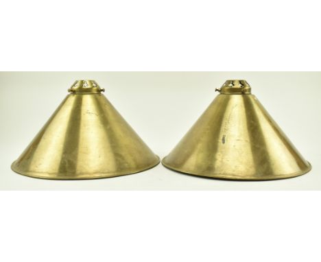 Two late 19th High Victorian - early 20th century Edwardian Arts and Crafts style brass lamp shades. The light shades pendant