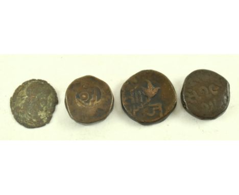 Three heavy bronze Indian hammered coins, along with a believed Ancient Roman coin. The Roman coin worn, with bust of Emperor