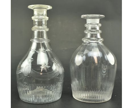 An early 19th century circa 1810 Irish decanter stamped Cork along with another similar decanter. The Irish decanter mallet s