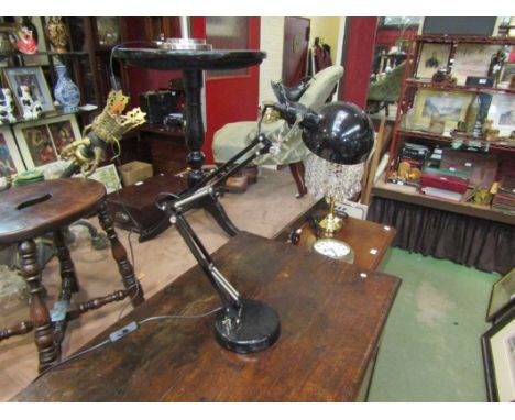 A black metal desk lamp
