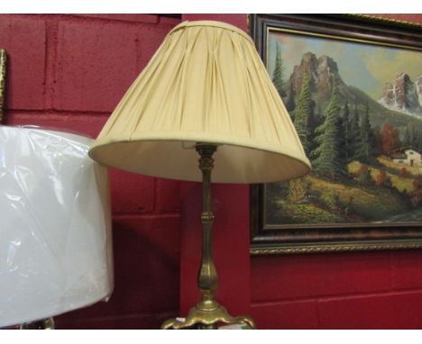 A brass three footed table lamp with pleated shade, 49cm tall