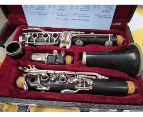 An unbranded clarinet, cased 