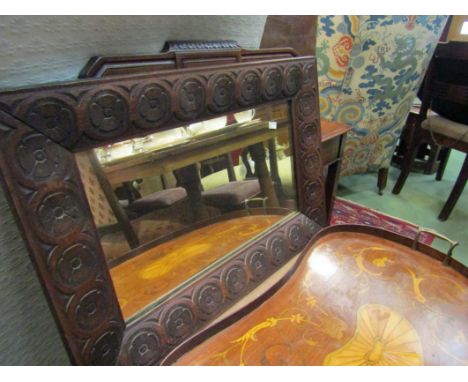 A 1930's oak framed mirror together with a 30's oval mirror