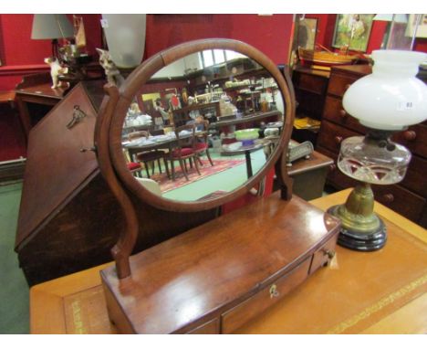 A George III mahogany bow front toilet mirror with three base drawers and key 