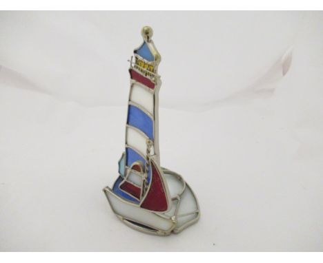 A leaded glass lighthouse design tea light holder, 16cm high