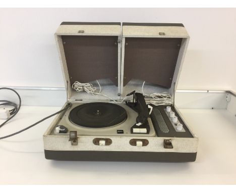 VINTAGE DUAL TURNTABLE - A Dual brand turntable of unknown model, with internal speakers. Powers up and plays through at leas