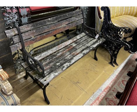 A Victorian style aluminium slatted garden bench, length 122cm together with a pair of cast metal bench ends