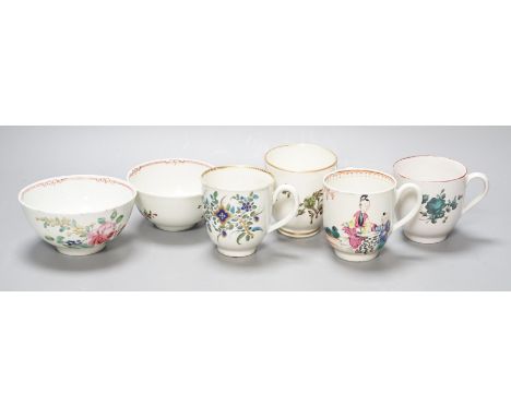 A Worcester coffee cup with oriental figures, another with flowers in green blue and gold, two Chelsea Derby coffee cups and 