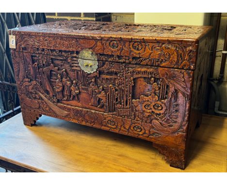 A Chinese carved camphorwood trunk, length 100cm, depth 50cm, height 60cm