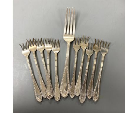 A set of ten Cartier sterling tea forks, 13.4cm and a similar table fork, 9oz.