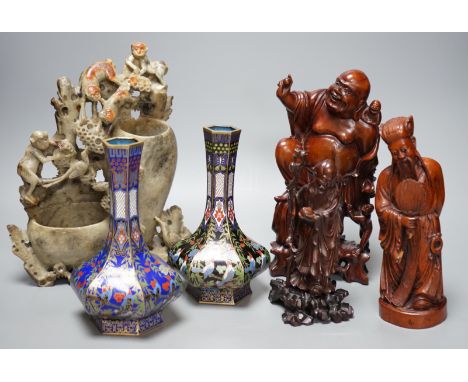 Two Chinese champlevé enamel vases, a soapstone carving and three early 20th century Chinese carved hardwood figures, tallest