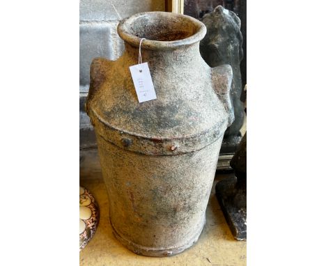 A glazed earthenware faux cast iron urn modelled as a milk churn, height 56cm