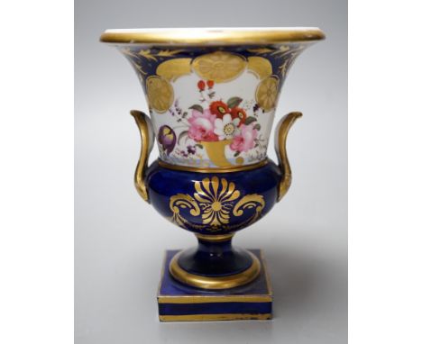 A Paris porcelain two-handled vase urn, with floral decoration, 16cm tall