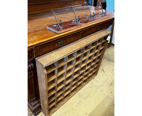 An oak pigeonhole unit, width 112cm, height 86cm together with a vintage four hook coat rack, width 86cm