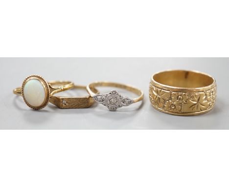 Four assorted 9ct rings, including band, white opal set, diamond chip set and millegrain diamond set, gross 11 grams.