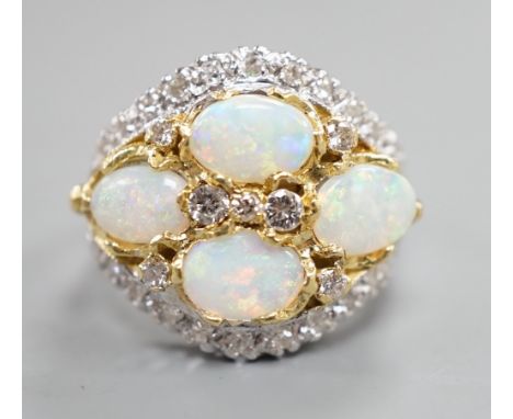 A modern 18ct white gold, diamond and four stone oval white opal set cluster dress ring, size N, gross weight 6.9 grams.