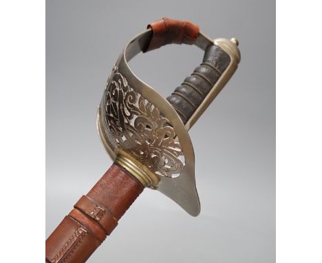 A George VI Royal Corps of Signals officer's sword in leather scabbard,100cms long,
